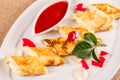 Rolled crepes stuffed with curd and berry jam Royalty Free Stock Photo
