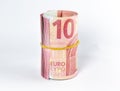 Rolled euro banknotes over white background Royalty Free Stock Photo