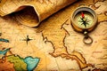 Rolled faded map old compass explorer gear Royalty Free Stock Photo