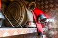 Rolled fire hoses, arranged in rows, in the glove compartment of the fire truck. Royalty Free Stock Photo
