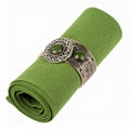 Rolled Green Fabric Napkin with Gold Decorative Ring Isolated on White Royalty Free Stock Photo