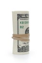 Rolled hundred dollar banknotes tied with