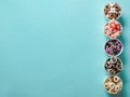 rolled ice creams in cone cups on blue background Royalty Free Stock Photo