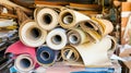 Rolled materials stacked workshop storage clutter Royalty Free Stock Photo