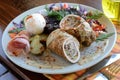 Rolled meat and stewed red cabbage garnish Royalty Free Stock Photo