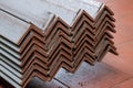 Rolled metal, L-profil. Stack of angle steel in the factory Royalty Free Stock Photo
