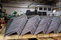 Rolled metal, L-profil. Stack of angle steel in the factory. Royalty Free Stock Photo