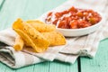 Rolled mexican nacho chips and salsa dip Royalty Free Stock Photo