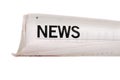 News headline, rolled up newspaper isolated on white background Royalty Free Stock Photo