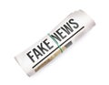 Rolled newspaper on white background Royalty Free Stock Photo