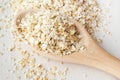 Rolled oats in a big spoon Royalty Free Stock Photo