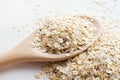 Rolled oats in wooden spoon Royalty Free Stock Photo