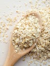 Rolled oats in a big spoon Royalty Free Stock Photo