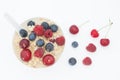 Healthy breakfast cereal oat flakes in white bowl, top view Royalty Free Stock Photo