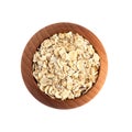 Rolled oats with wooden bowl isolated on white background Royalty Free Stock Photo