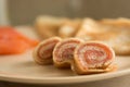 Rolled pancakes with smoked salmon Royalty Free Stock Photo