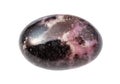 rolled pink and black Rhodonite gemstone isolated Royalty Free Stock Photo