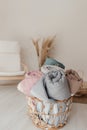 Rolled quilts and blankets of different colors. concept of coziness, comfort and warmth at home Royalty Free Stock Photo