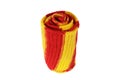 rolled red-yellow striped wool scarf isolated on white background Royalty Free Stock Photo