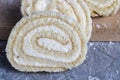 a rolled roll of soft cake and sweet curd filling