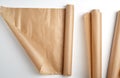 rolled rolls of parchment baking paper on a white background Royalty Free Stock Photo