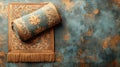 Rolled rug with golden patterns on a textured blue background Royalty Free Stock Photo
