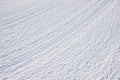 Rolled ski slope, rilled snow background