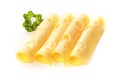 Rolled slices of cheese garnished with parsley Royalty Free Stock Photo