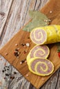 Rolled Stuffed Chicken Breast. Chicken or Turkey Roulade. Low Carb Chicken Roll Ups with cheese on a wooden table with Royalty Free Stock Photo