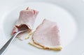 Rolled sugar ham on white Royalty Free Stock Photo