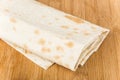 Rolled thin Armenian lavash on bamboo board