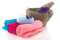 Rolled towels with lavender soap Royalty Free Stock Photo