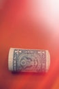 Rolled up American one dollar bill. Royalty Free Stock Photo