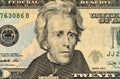 A rolled up American twenty dollar bill