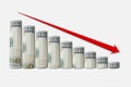 Rolled up dollar bills falling graph with red down arrow. Business concept Royalty Free Stock Photo