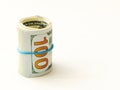 Rolled up dollar bills on a white background. Royalty Free Stock Photo