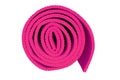 Rolled up pink yoga mat isolated on white background. Royalty Free Stock Photo