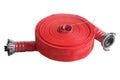 Rolled up red fire hose extension soft pipe on white Royalty Free Stock Photo