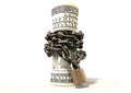 Rolled Up And Shackled Dollars Standing Royalty Free Stock Photo