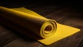 Rolled up yellow mat for yoga practice generated by AI