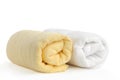 Rolled up yellow and white beach towels