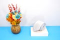 Rolled white tie with display stand flower vase together closeup view Royalty Free Stock Photo