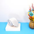 Rolled white tie with display stand flower vase together closeup view Royalty Free Stock Photo