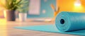 rolled yoga mat on desk creates serene workspace atmosphere Royalty Free Stock Photo