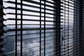 Roller blinds on modern windows Blinds on office windows Modern style roller blinds control the lighting range Royalty Free Stock Photo