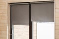 Roller Blinds on Panoramic Window at Wooden Wall Royalty Free Stock Photo