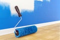 Roller brush on floor. Home interior