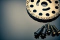 Roller chain with sprocket on dark background. It is used on cars, motorcycles, bicycles and in mechanical engineering. Royalty Free Stock Photo