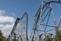 roller coaster against blue sky at Fuji-Q Highland, Yamanashi, Japan