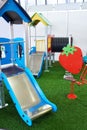 Roller coaster for children on playground indoors